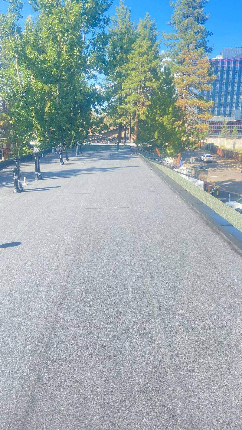 Grey torch-down flat roof on a commercial building in the Lake Tahoe area